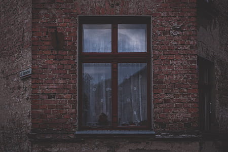 closed brown wood-framed clear glass window thumbnail