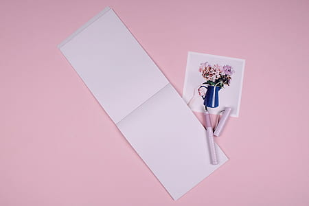 pink pen on white paper thumbnail