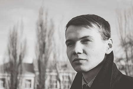 Close-up of Young Man Against Sky thumbnail