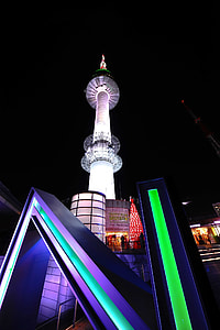 low angle photo of building with light during nighttime thumbnail