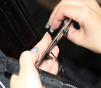 person cutting hair thumbnail