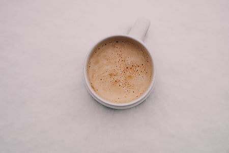 coffee cup filled with coffee thumbnail