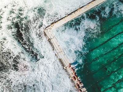 aerial view photography of ocean wave thumbnail