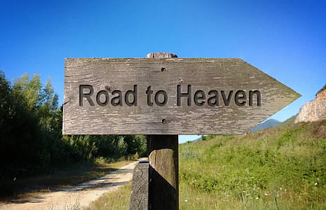 grey wooden Road to Heaven signage thumbnail