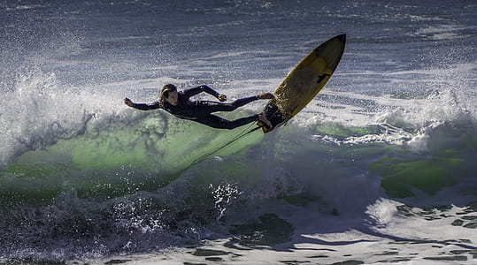 Photograph of a Person Surfing thumbnail