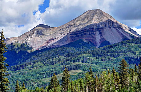 This is Coal Bank Pass along Colorado's Million Dollar Highway between Silverton and Ouray. This massively scenic and breathtaking highway between Ouray and Silverton is also called the San Juan Skyway. The weather this day was overcast and cloudy and consequently allowed me to use HDR High Dynamic Range techniques in bringing out the vivid colors in this composite image. thumbnail