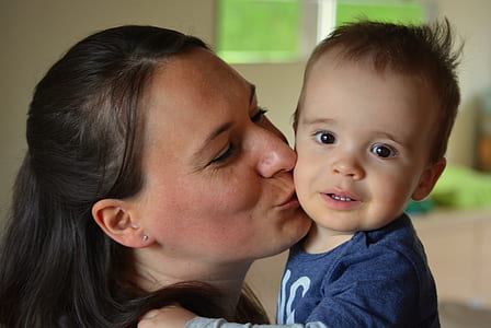 woman kissing toddler thumbnail