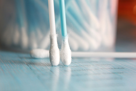 two white ear swabs thumbnail