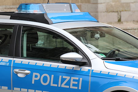close-up photography of blue and white vehicle thumbnail