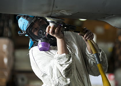 person using angle grinder thumbnail
