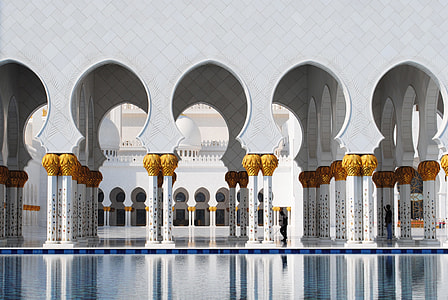 outdoor pool in white building thumbnail