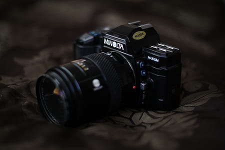 Selective Focus Photo of Black Minolta SLR Camera thumbnail
