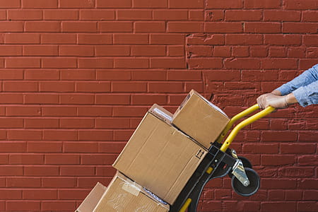 Shipping Boxes On Red Brick Photo thumbnail