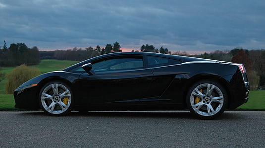 black Lamborghini Gallardo on road thumbnail