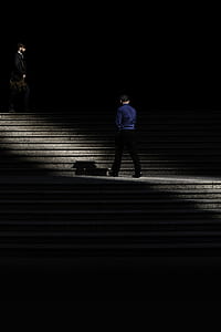 man standing on concrete stairs thumbnail