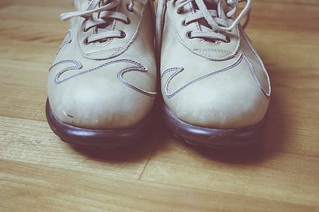pair of brown lace-up shoes on floor thumbnail