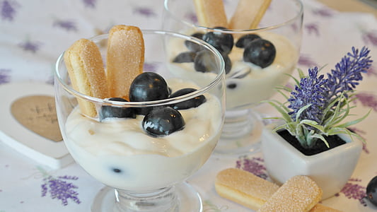 close-up photography of round black fruit and baked pastry thumbnail