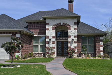 brown and white brick wall house thumbnail
