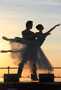male and female ballerinas during sunset thumbnail
