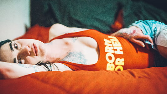 woman lying on bed thumbnail