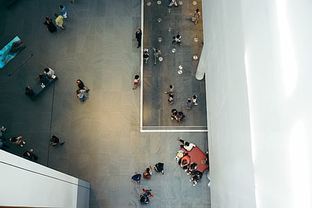 high angle view of people walking inside building thumbnail