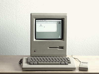 gray computer setup on table thumbnail