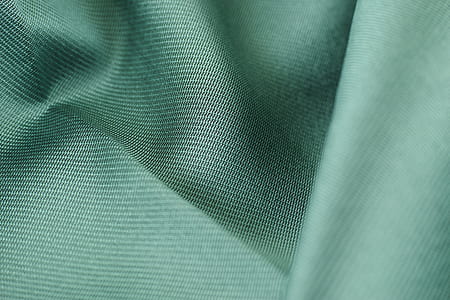 closeup photo of green cloth thumbnail