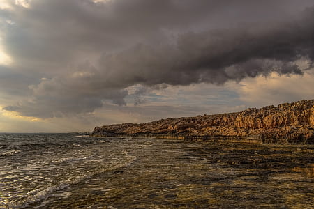 blue ocean waves towards shore during daytime thumbnail
