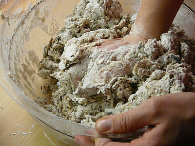 person mixing mixture on clear glass bowl thumbnail