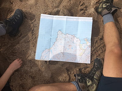world map on brown rug thumbnail