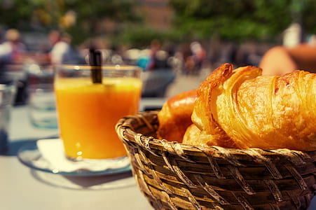 basket of baked bread near clear drinking glass thumbnail
