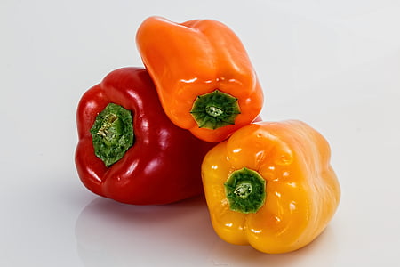 three red, orange, and yellow bell peppers thumbnail