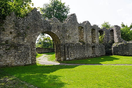 gray arch under white clouds thumbnail