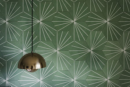 silver pendant lamp with green backdrop thumbnail