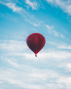 photo of red air balloon up in the sky thumbnail