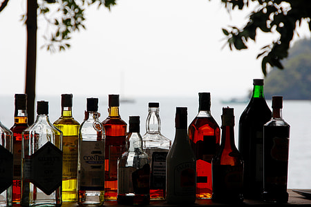 liquor bottles on table thumbnail