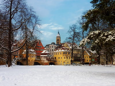 landscape photography of yellow buildings thumbnail