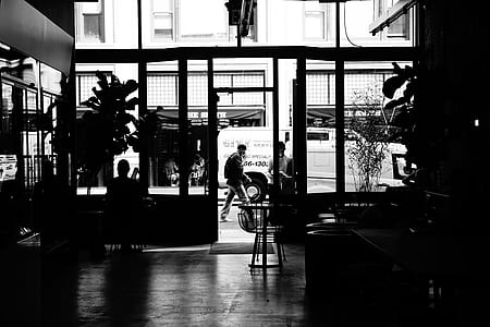 man walking near white vehicle thumbnail