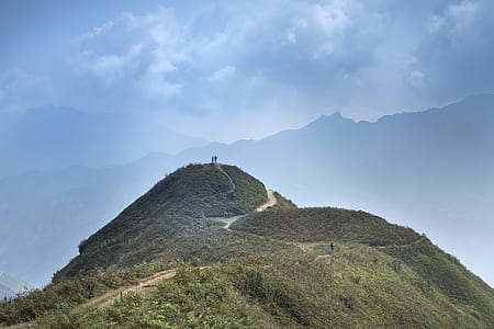 two people standing on top of mountain thumbnail