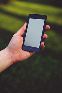 person holding black Android smartphone thumbnail