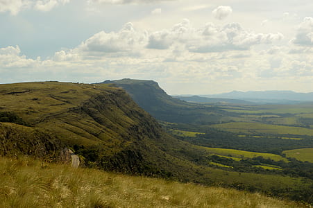 Green Valleys Under Cloudy Sky thumbnail