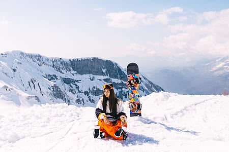 woman sitting on icy field thumbnail