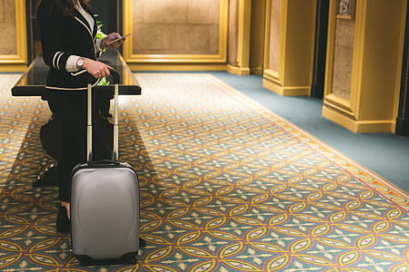 Businesswoman In Hotel Lobby Photo thumbnail