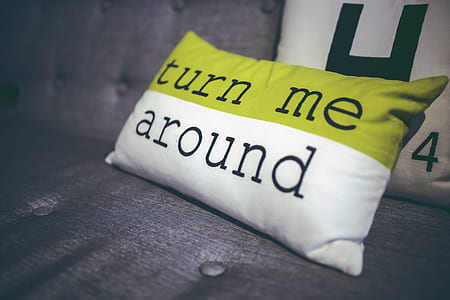 shallow focus photography of throw pillow thumbnail