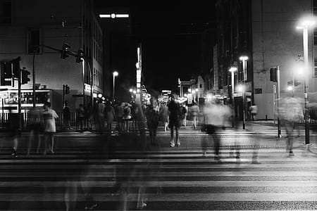 Group of People Crossing Pedestrian Lane in Greyscale thumbnail