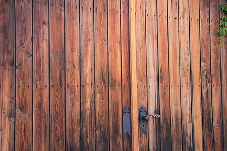 closed brown wooden gate thumbnail