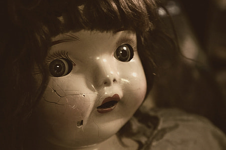 black haired doll with cracks thumbnail