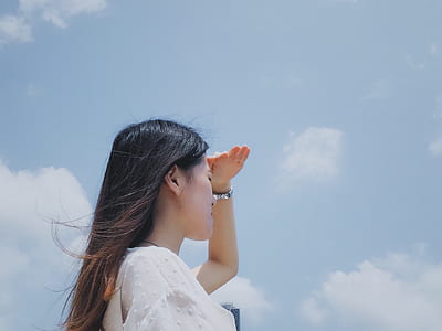 woman wearing white top thumbnail