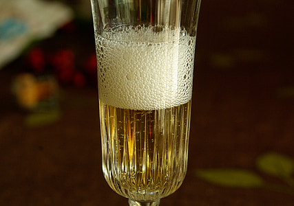 clear drinking glass with brown liquid thumbnail