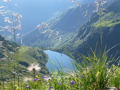 river and mountain during daytime thumbnail